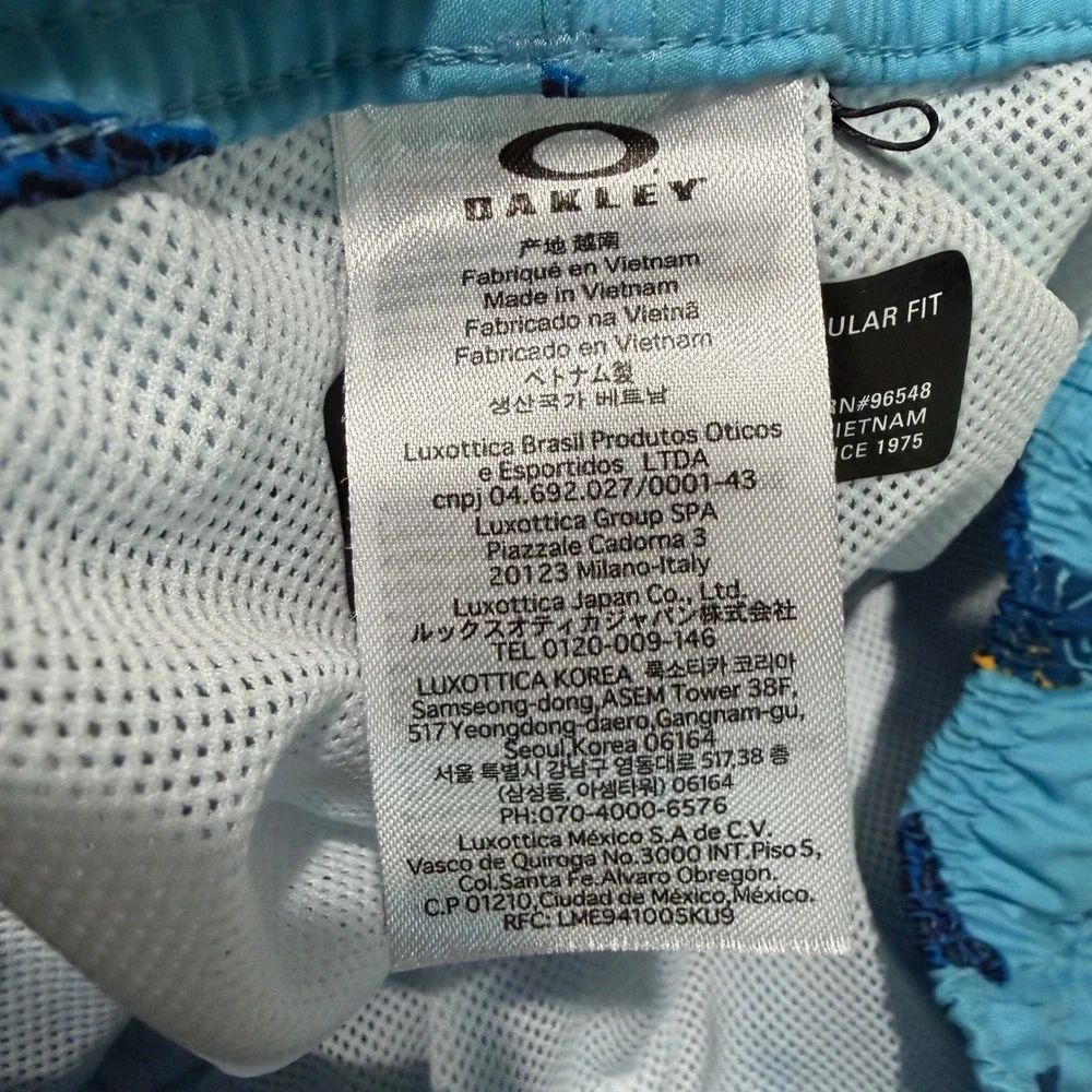 Oakley Swim Trunks Men L Light Blue Excellent Tropical Toucan Print Mesh Lined